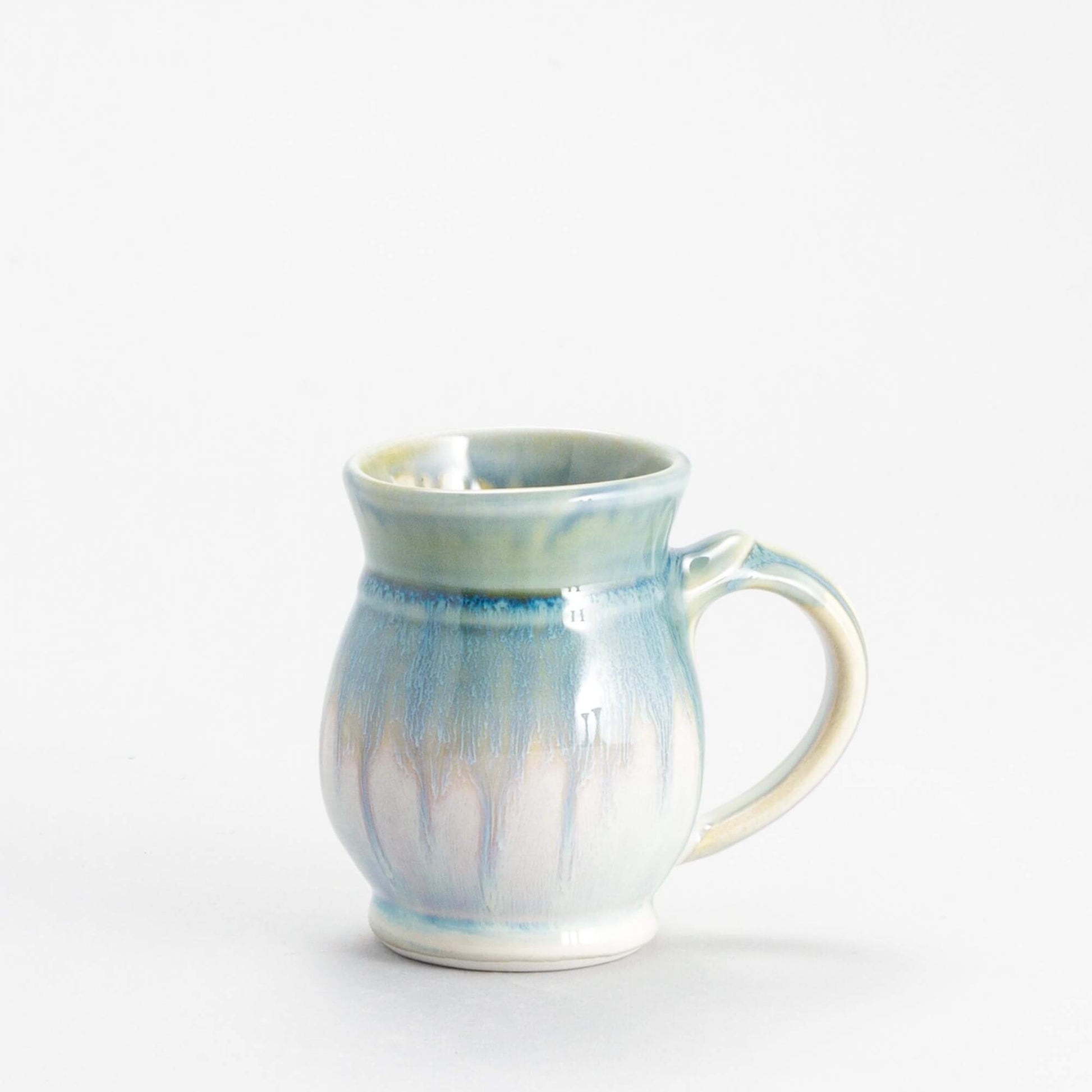 Handmade Pottery Curvy Mug made by Georgetown Pottery in Maine Ivory & Blue Oribe