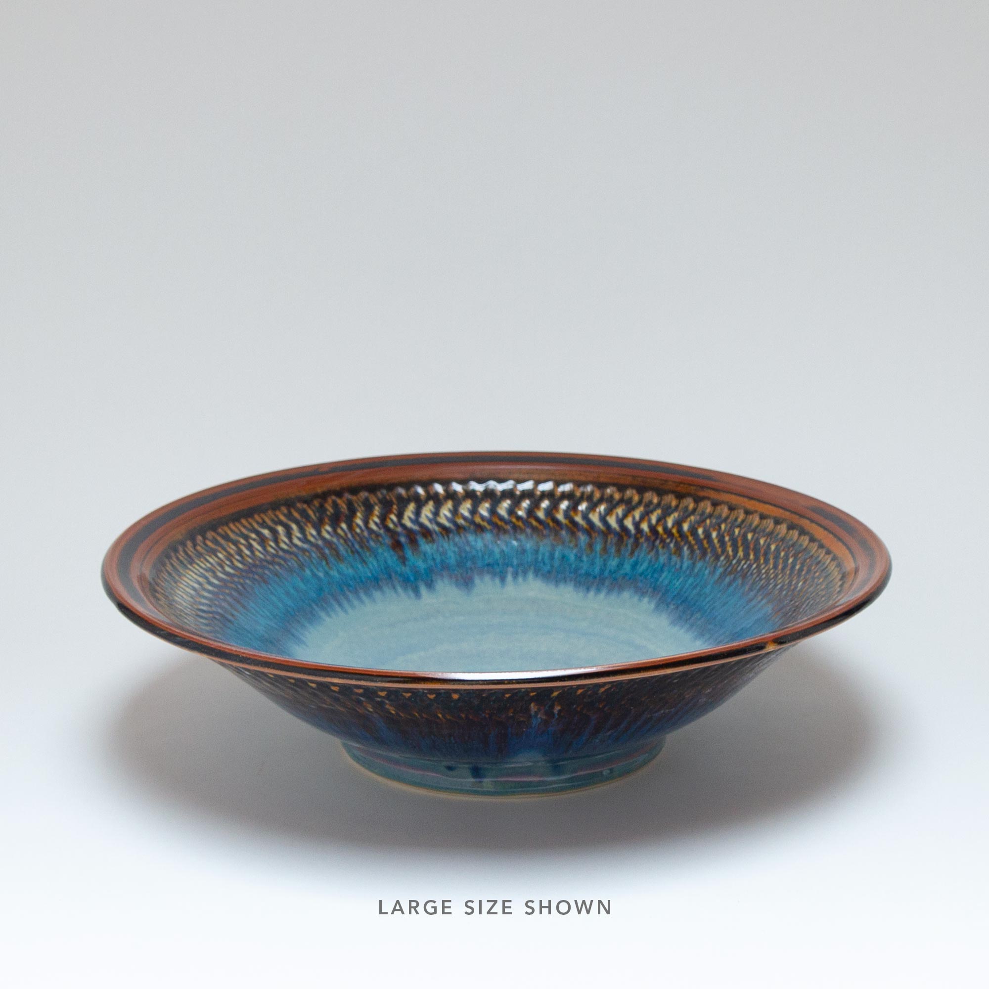 Footed serving clearance bowl