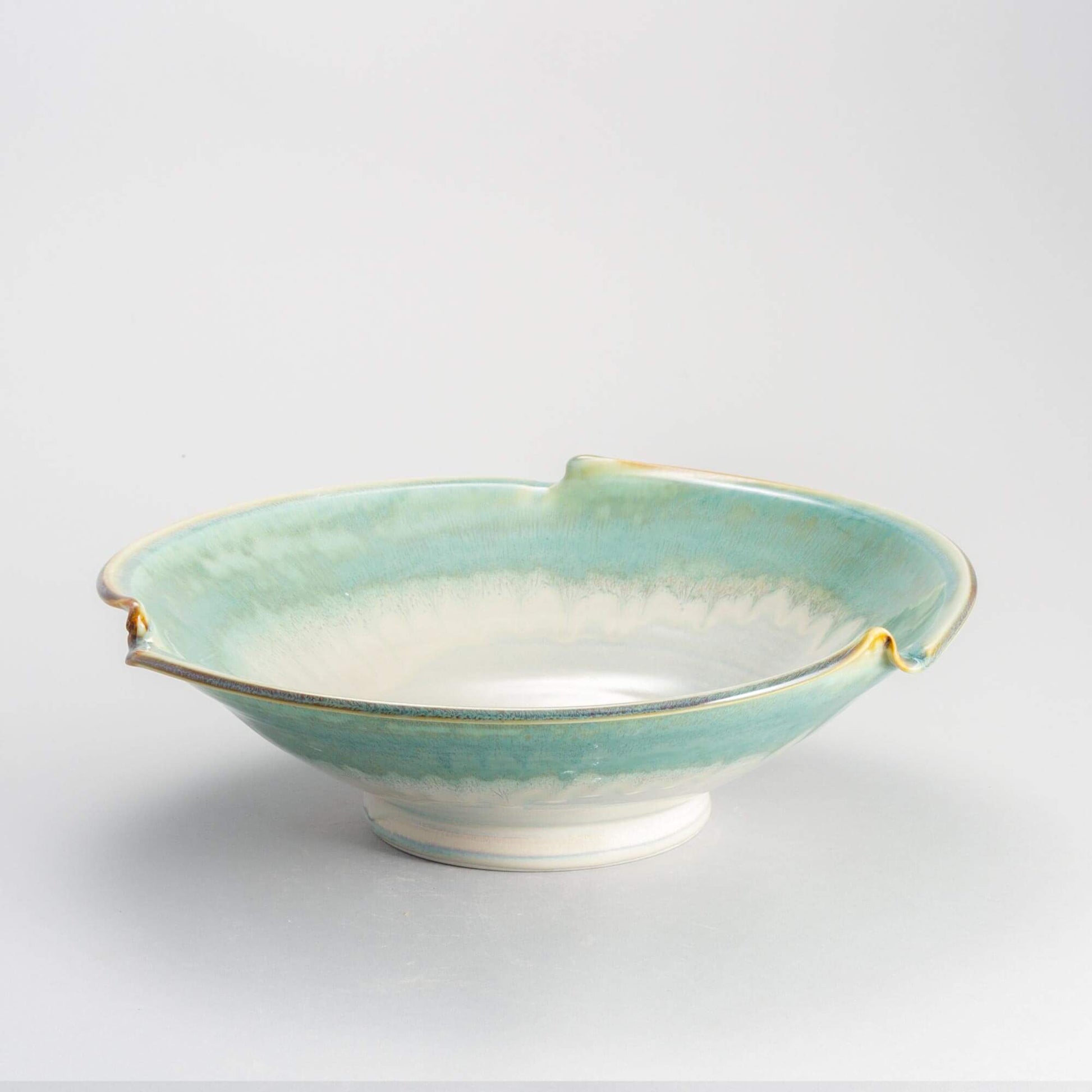 Handmade Pottery Signature Wave Bowl in Ivory & Green pattern made by Georgetown Pottery in Maine