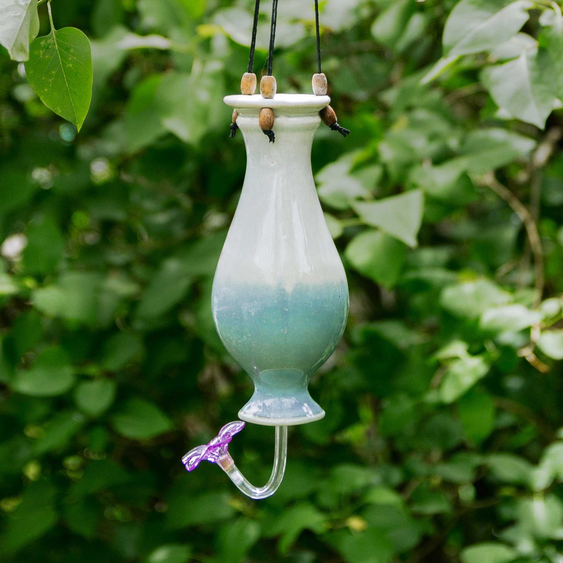 Handmade Pottery Bottle Hummingbird Feeder in Ivory & Blue pattern made by Georgetown Pottery in Maine